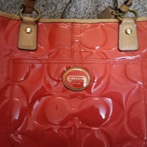 Orange coach bag matching wallet